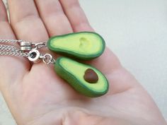 "This is a super adorable BFF necklace for 2 friends. An original gift and amazing way to show your feelings to your friend for any special occasion. THE SET INCLUDES: Two green avocado necklace with two chains of your choice. These realistic avocado charms are made entirely by hand from polymer clay with much of love and attention to every detail. The size of the avocado is 3 cm/ 1.8 cm - approx 1.2\"/ 0.7\" I offer these necklaces with 925 sterling silver chain, 925 sterling silver plated chai Avocado Necklace, Two Bff, Avocado Keychain, Green Avocado, Bff Necklace, Food Vegetarian, Couples Keychains, 2 Friends, Bff Necklaces