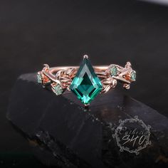 Unique Kite cut Emerald Engagement Ring Solid 14k Rose Gold Promise ring for her Leaf and Vine Ring Green Gemstone Ring Anniversary Gifts Engagement ring Center Stone: Lab emerald Cut: kite cut Size:7*10mm Accent Stone:moss agate Total:0.14ctw Width:3.0mm Thickness :1.3mm  Ring Size & Gold Color Ring Size: 3US-10US available. But if you need a smaller or larger size, please feel free to contact me. I would love to make it for you at a reasonable price. Gold Color:10K/14K/18K Yellow/ White/Rose Gold and platinum available Processing time Dute to all our jewelry are made to order for each customer.Your package will ship within 3-4 weeks of purchase.We need to ensure the quality of each jewelry.Thank you for your patience.  More Information *Custom Order *Rush Orders *Payment plan *Engraving Rose Gold Emerald Ring For Promise, Emerald Cut Rose Gold Birthstone Rings, Emerald Diamond Ring In Rose Gold, Rose Gold Emerald Ring With May Birthstone, Rose Gold Emerald Rings With Gemstone, Rose Gold Emerald Gemstone Rings, Emerald Cut 14k Rose Gold Jewelry For Anniversary, Rose Gold Emerald Cut Ring For May Birthstone, Fine Jewelry Rose Gold Ring For May Birthstone