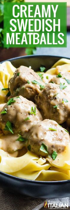 creamy swedish meatballs with gravy on top in a black bowl, garnished with parsley