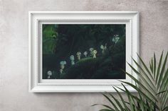 there is a painting on the wall with plants in front of it and a potted plant next to it