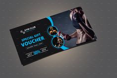 a black and blue gift voucher with an image of a woman's torso