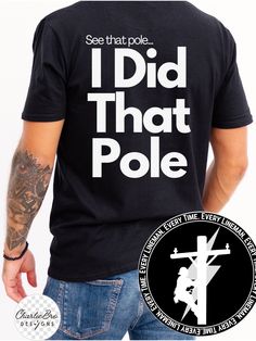 the back of a man wearing a black t - shirt that says i did that pole