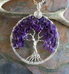 "This Amethyst Tree of Life Pendant is hand wire wrapped with gorgeous Amethyst gemstone using .925 Sterling Silver wires for the tree trunks an branches.  It is a beautiful gift to give or receive! ~~The pendant measures about between 1.40 to 1.50 inch in diameter. The US quarter coin is about 1 inch(25mm) in diameter.  ~~The pendant  comes on a 925 Sterling Silver cable chain. The chain is flexible and durable enough to hold the pendant. if you would like different 20\", 22\" at no extra charge. Please let me know. ~~  Each pendant is handmade, so please allow slight variations from the shape of the branches and placement of the stones as shown The Tree of Life is a universal symbol found in many spiritual traditions around the world. The tree of knowledge, connecting to heaven and the u Purple Hand Wrapped Spiritual Jewelry, Spiritual Purple Wire Wrapped Jewelry, Spiritual Purple Wire-wrapped Jewelry, Unique Purple Wire Wrapped Jewelry, Purple Amethyst Wire Wrapped Crystal Necklace, Purple Sterling Silver Wire Wrapped Jewelry, Nickel-free Amethyst Pendant Jewelry, Spiritual Silver-plated Wire-wrapped Jewelry, Hand Wrapped Amethyst Crystal Necklace For Gift