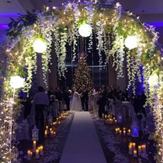 the wedding ceremony is decorated with flowers and candles