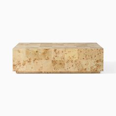 a large wooden block with different shapes and sizes on the top, sitting in front of a white background