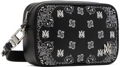 Buffed leather messenger bag in black. · Paisley logo pattern embroidered throughout · Adjustable and detachable leather crossbody strap · Logo hardware at face · Two-way zip closure · Logo-woven canvas lining · H5 x W7.75 x D2.25 Supplier color: Black Luxury Leather Shoulder Bag With Embroidered Logo, Luxury Embroidered Logo Crossbody Bag, Luxury Leather Bags With Embroidered Logo, Black Leather Shoulder Bag With Embroidered Logo, Leather Shoulder Bag With Embroidered Logo For Travel, Designer Shoulder Bag With Embroidered Logo For Travel, Leather Shoulder Bag With Embroidered Logo For Everyday Use, Everyday Leather Shoulder Bag With Embroidered Logo, Classic Rectangular Bags With Embroidered Logo