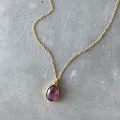 This beautiful piece features a stunning purple amethyst crystal, which is known for its metaphysical properties. The gemstone necklace comes on a delicate 18k chain, making it perfect for layering or wearing alone.

 	Chain: 18K Gold Plated
 	
Closure: Lobster claw
 	
Style: Boho & Minimalist
 	The model is pictured wearing an 18"
 	Collection: Amethyst Necklace