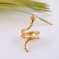 "Gold snake ring, 14k Gold Fill snake ring, adjustable snake ring, spiral ring, brass ring, gold wrap ring, adjustable ring JEWELRY CATEGORY:- HANDMADE RING PLATING:- 14K GOLD FILLED METAL: - BRASS RING SIZE:- ALL SIZES AVAILABLE PURTY:- 14k GOLD PLATED ❏ Shipping information : ✈ Free Shipping (DHL) 🎁 Free Gift Box ↻ 30 Days Return ⌛ 24 Handling Time ► Tracking number ✔ ► Insurance ✔ ► Expedited / Express shipping - check our \"shipping upgrades\" when you checkout ❏ Important information ✪ My Gold Wrap Ring, Serpent Ring, Snake Ring Silver, Time Tracking, Spiral Ring, Gold Wrap, Fancy Gifts, Wrap Ring, Snake Ring