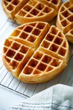 three waffles sitting on top of a cooling rack