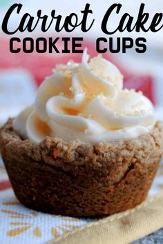 a close up of a cupcake on a napkin with the words carrot cake cookie cups