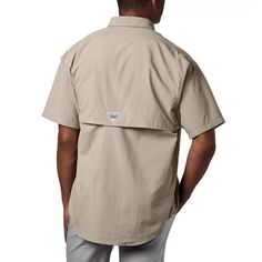 FISH EASY Designed specifically for anglers, this lightweight, Relaxed Fit, nylon shirt dries fast, keeps you cool, and protects against UV rays. COOLING Mesh-lined back vents let in and out a cooling breeze—perfect in hot, humid weather. PERFORMANCE DETAILS A rod holder provides hands-free convenience, and four chest pockets help store your small essentials. Omni-Shade UPF 50 provides maximum protection for long hours in the sun Hidden vents at shoulders add bonus breathability Quick dry Relaxe Mens Fishing Shirts, Gulf Stream, Humid Weather, Columbia Shirt, Sun Shirt, Rod Holder, Mens Short Sleeve Shirt, Columbia Sportswear, Country Outfits