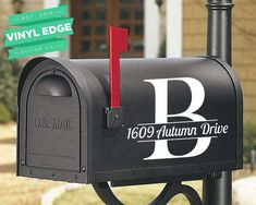 a black mailbox with the letter b on it