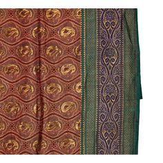 A lavish sari from India, hand-crafted out of a single piece of silk brocade. Mid 20th Century, circa 1970. Gold Paisley brocade on burgundy / deep red silk, with blue, green and gold lateral trim. Fully reversible with opposite colors.   Can be used as a throw, wall tapestry, curtain or bedspread.   Measures 107" long, 43" wide. Opposite Colors, Gold Paisley, Indian Patterns, Indian Sari, Silk Brocade, Red Silk, Vintage Silk, Single Piece, Deep Red