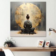 a woman sitting on the floor in front of a painting with a full moon behind her