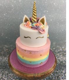 there is a cake that has a unicorn on it