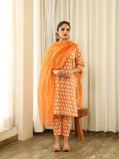 Anita - Orange Mirror Embroidered Printed Kurta Set (Set of 3) By Gulabo Jaipur now available at Trendroots Designer Straight Kurta Palazzo Set In Mulmul, Designer Mulmul Palazzo Set With Straight Kurta, Mulmul Palazzo Set With Resham Embroidery And Straight Kurta, Cotton Silk Lawn Suit With Block Print Straight Kurta, Cotton Silk Lawn Suit With Block Print, Unstitched Chanderi Salwar Kameez With Block Print, Chanderi Bandhani Print Palazzo Set With Straight Kurta, Eid Block Print Straight Kurta Salwar Kameez, Bandhani Print Chanderi Palazzo Set With Straight Kurta