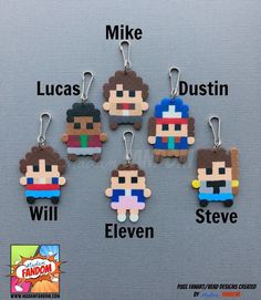 six different keychains with the names of each character on them, including luke, lucas, dustin, and eleven