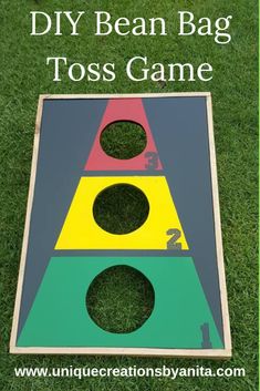 a diy bean bag toss game on the grass