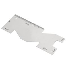 a ruler that is on top of a white surface