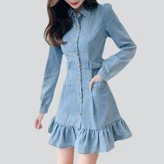 Be the queen of chic this summer with our 90's-style mini denim dress with ruffles! This light wash denim dress with buttons closure is the perfect statement piece to add to your wardrobe. It's stylish. sassy and ready to take on the summer heat!Distinctive Features: 90s Style: Take a trip down memory lane with this classic 90s silhouette. The frills and buttons closure give the dress an extra touch of style. Light Wash: The light wash denim is perfect for the summer season and will look great w Trendy Ruffled Denim Top For Spring, Chic Light Wash Mini Denim Dress, Spring Button-up Ruffle Dresses, Trendy Cotton Dress With Ruffle Hem, Spring Button-up Dresses With Ruffles, Fitted Mini Denim Dress With Ruffles, Fitted Denim Dress With Ruffle Hem, Fitted Denim Dress With Ruffles, Denim Blue Mini Dress With Ruffles