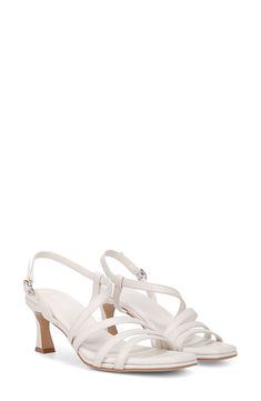 Asymmetric vamp straps lend modern dimension to an elegant sandal set on a cushioned footbed and flared heel. 2 1/4" heel Adjustable slingback strap with buckle closure Cushioned footbed with Contour+ technology Synthetic upper, lining and sole Imported Elegant Sandals, Slingback Sandal, Sandal Women, Warm White, White Leather, Womens Sandals, Buckle, Nordstrom, Technology