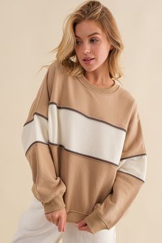 The Kyler Crew Neck Sweatshirt is the perfect combination of cozy and chic. With long sleeves, ribbed trim at the neckline, cuffs and hem, and a piping detail, you'll be rocking a classic and comfortable look for any occasion. As a bonus, it's made of French terry fleece for an extra soft touch! Pre-order yours now in Khaki & Cream. 50% Cotton 50% Polyester Color Block Sweatshirt, French Terry, Pre Order, Piping, Color Block, Photo Editing, Crew Neck Sweatshirt, Round Neck, Relaxed Fit