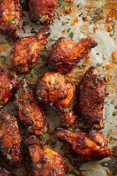 baked bbq chicken wings with parsley on top and the words baked bbq chicken wings