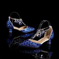 Make a dazzling statement on your wedding day with these exquisite blue pointed-toe crystal wedding shoes. The combination of chunky rhinestone heels and a captivating blue hue creates a stunning visual effect that will surely turn heads as you walk down the aisle. These shoes are designed to add a touch of glamour and sophistication to your bridal ensemble, making them the perfect choice for a bride who wants to shine on her special dayColor: BlueProduct category: Wedding shoesShoe height: Low- Crystal Wedding Shoes, Heels Blue, Latin Shoes, Social Dance, Blue Point, Block Sandals, Rhinestone Shoes, Bow Sandals, Rhinestone Heels