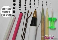 several pens, pencils and markers are lined up on a white paper with black dots