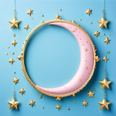 a pink crescent with gold stars hanging from it's sides on a blue background