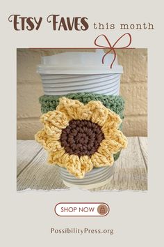 a crocheted sunflower sitting on top of a stack of cups with the words easy