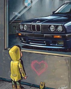 a person standing in front of a car with a heart drawn on the wall next to it