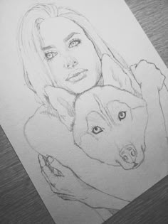 a drawing of a woman holding a dog