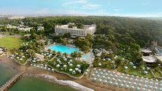 an aerial view of the resort and pool area