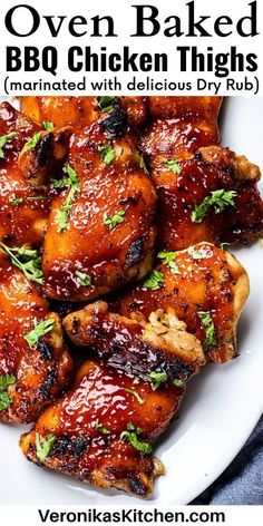 baked bbq chicken thighs on a white plate