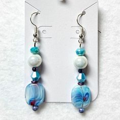 J45 Handmade Beaded Blue And Purple Dangle Earrings This Is A Listing For A Live Show. Please Watch The Live Show For More Information. Chip Bead Jewelry, Purple Dangle Earrings, Pandora Earrings, Valentines Earrings, Spiral Earrings, Seashell Crafts, Ear Rings, Red Earrings, Jewerly Diy