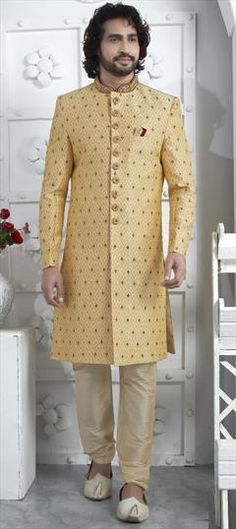 Gold color Sherwani in Georgette fabric with Bugle Beads, Embroidered, Thread, Zardozi work Designer Yellow Sherwani With Dabka Work, Yellow Sherwani With Dabka Work For Designer Wear, Festive Yellow Sherwani With Dabka Work, Yellow Embroidered Bandhgala For Wedding, Yellow Long Sleeve Sherwani For Wedding, Zardozi Work, Wedding Sherwani, Beads Work, Wedding Gold