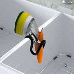 PRICES MAY VARY. Universal & Adjustable design - Just fix the bracket easily on the central divider of the sink, and you can adjust the width of the clip at will. Fits all double sinks. Note: (not suitable for single sink), Small Size & Saves Sink Space - Unlike kitchen sink suction cup varieties, It takes very little space in the sink. More effective than large kitchen sponge holders and organizers, which get in the way while dishwashing. removes easily which allows for convenient sink cleaning Cape Cod Kitchen, Sink Cleaning, Wand Holder, Kitchen Sponge Holder, Double Sinks, Sink Caddy, Kitchen Sponge, Clean Sink, Sponge Holder