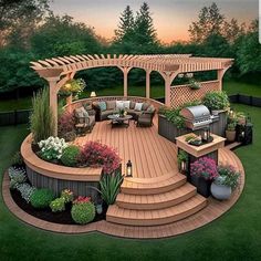 an outdoor deck with seating and grill in the center, surrounded by flowers and trees