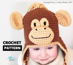 a small child wearing a crochet monkey hat