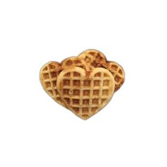 two heart shaped waffles sitting on top of each other