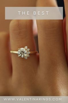 a woman's hand with an engagement ring on it and the words, the best