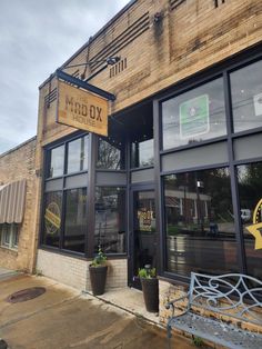 the outside of a restaurant with large windows