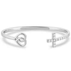 Show your love for your faith in a stylish way with the Love and Faith Cuff Bracelet. This reverse cuff has a smooth silver tone that is perfect for any occasion. One side of the cuff features a heart with the Christian fish symbol, Ichthys, serving as a reminder that we all carry God™s love. The other side of the reverse cuff is a cross with sparkling clear cubic zirconia stones to create a simple and stunning design. One size fits most. Montana Armor Protective Coating Open top cuff design Western Style Silver Cuff Bracelet Gift, Adjustable Sterling Silver Western Cuff Bracelet, Nickel-free Silver Cross Bracelets, Elegant Cross-shaped Metal Bracelet, Fish Symbol, Unique Nickel-free Turquoise Cuff Bracelet, Tractor Supplies, Women Accessories Jewelry, Montana