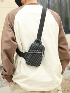 a man wearing a white shirt and brown jacket carrying a black bag on his back