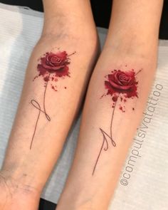 two people with matching tattoos on their arms, one has a rose and the other has scissors