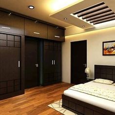 a bedroom with wooden flooring and dark colored furniture, including a large bed in the middle