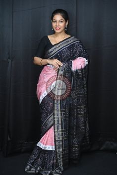 Weaver communities of Maniabandha and Nuapatana of Odisha traditionally weave this kind of saree. Common motifs are star, temple, conch, rudraksh, fish, chakra, lotus etc. The inspiration of all its designs comes from nature. It is the best of single ikat; one of warp and weft is tied and dyed prior to weaving. The borders and the pallas have tremendous variety and each one of them is attractive and praiseworthy. Specification:  Occasion: Festive Wear Fabric: Khandua Cotton Primary Color: Pink S Black Handloom Pre-draped Saree For Festivals, Black Handloom Pre-draped Saree For Puja, Traditional Black Handloom Pre-draped Saree, Black Bollywood Traditional Wear With Bandhani Print, Black Pre-draped Saree For Puja And Festivals, Traditional Black Dupatta With Weaving Work, Black Saree With Woven Motifs For Festivals, Black Pre-draped Saree For Puja With Traditional Patterns, Black Traditional Wear With Woven Motifs For Diwali