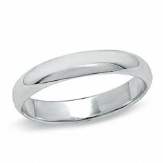 a white gold wedding ring on a white background