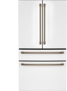 a white refrigerator freezer sitting inside of a kitchen